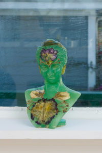 Genevieve Belleveau, Bloom & Bust I, 2018. Frosted acrylic, latex, flowers. 8 x 5.5 x 4.5 inches. Courtesy the artist and Garden, Los Angeles. Photo: Jeff McLane.