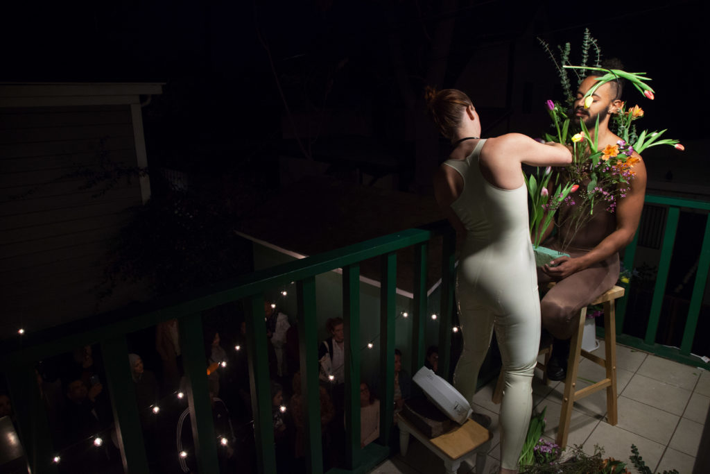 Genevieve Belleveau, Transactional Aesthetics, 2018. Performed with Themba Alleyne. Durational performance with spoken word, harness, and tulips. Courtesy the artist and Garden, Los Angeles. Photo: Cedric Tai.