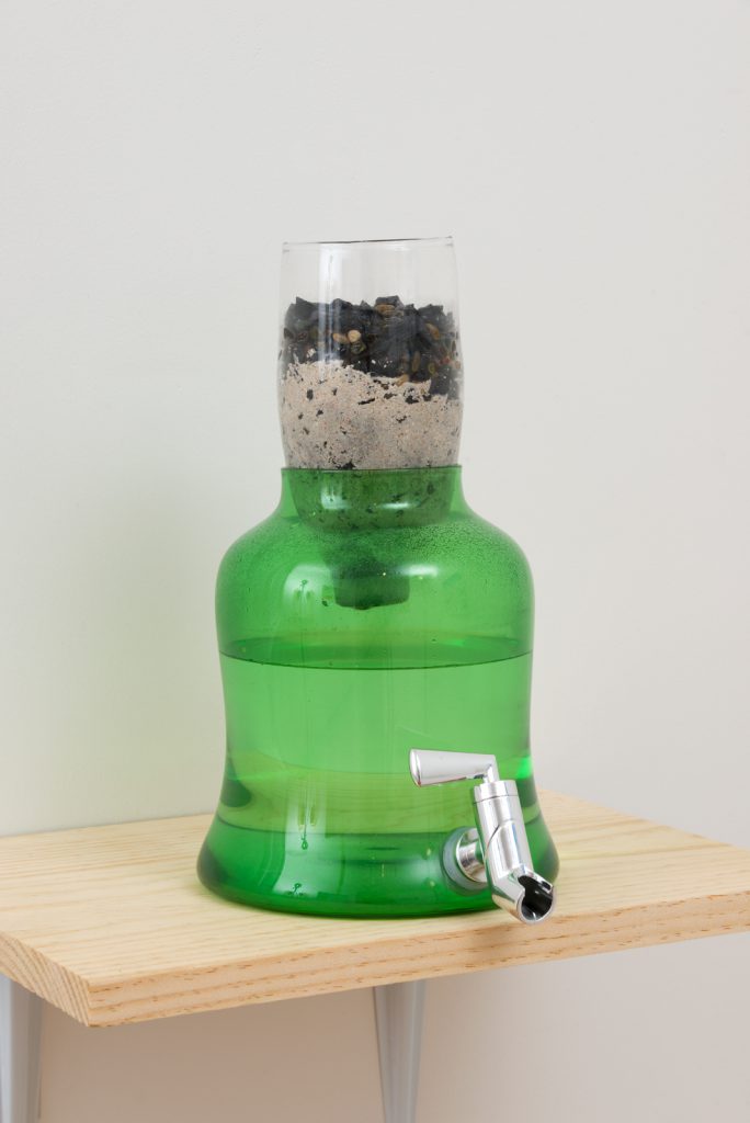 laub and Jennifer Moon, Water filter from GFT (Gut Fairies Transplant), Phoenix Rising, Part 3: laub, me, and The Revolution (The Theory of Everything), 2015. Mouth blown glass, rocks, sand, charcoal, filtered water. 11.5 x 6.5 x 8.25 inches. Courtesy Commonwealth &amp; Council, Los Angeles. Photo: Jeff McLane.